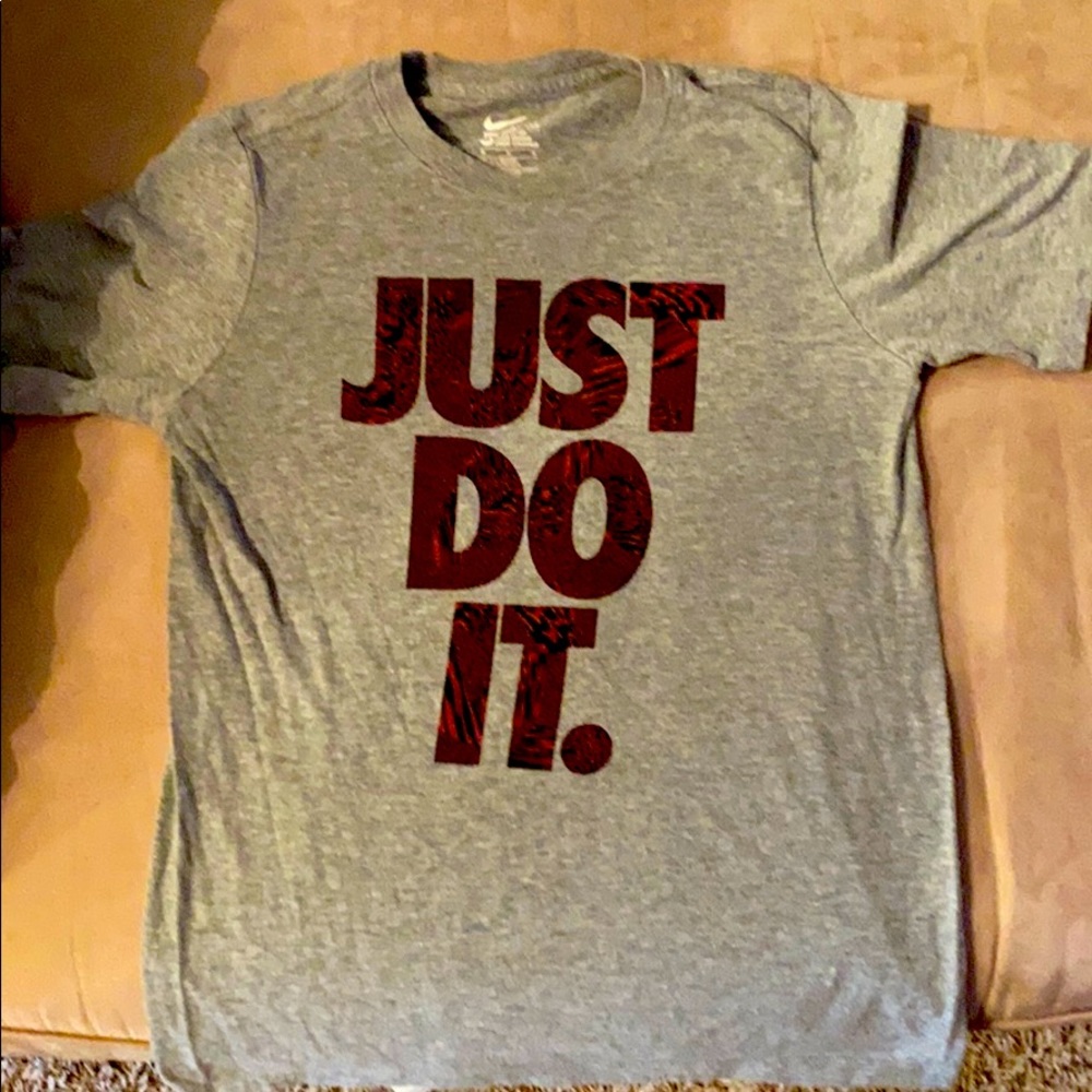 A grey nike shirt